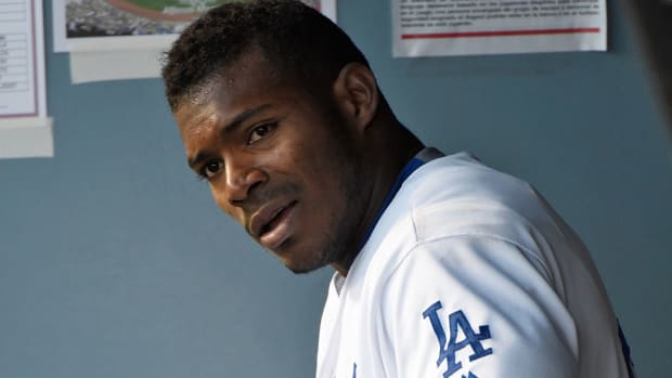 yasiel-puig-throws-out-trevor-story-video-dodgers-rockies.jpg